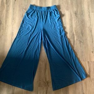 Natural life, blue wide leg pants with pockets. High rise fit soft material.